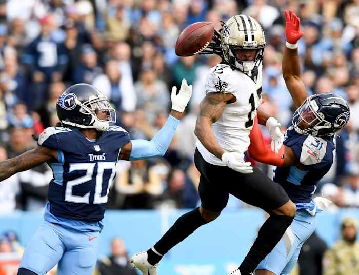 Titans cornerback Janoris Jenkins (20) and safety Kevin Byard (31) break up a pass intended for Saints receiver Kevin White (17). George Walker IV / Tennessean.com / USA TODAY NETWORK